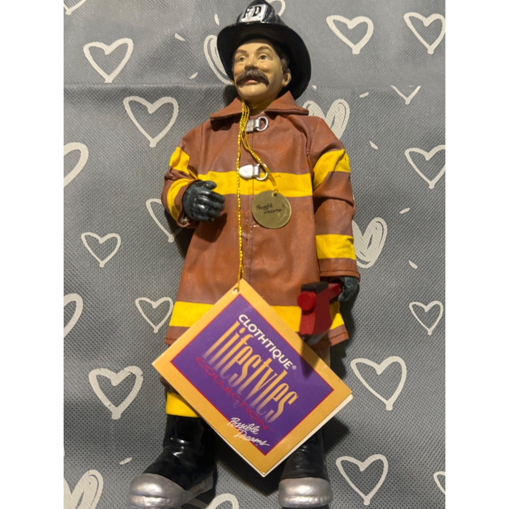 Clothtique Lifestyles Possible Dreams Firefighter Figurine with Axe Brown Yellow